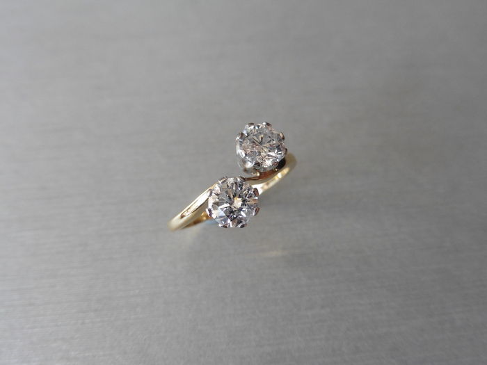 1.40ct diamond 2 stone twist ring. 2 brilliant cut diamonds, I colour and I1/i2 clarity weighing 1.