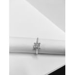 1.01ct diamond solitaire ring with a princess cut diamond. H colour and 12 clarity. Set in 18ct gold