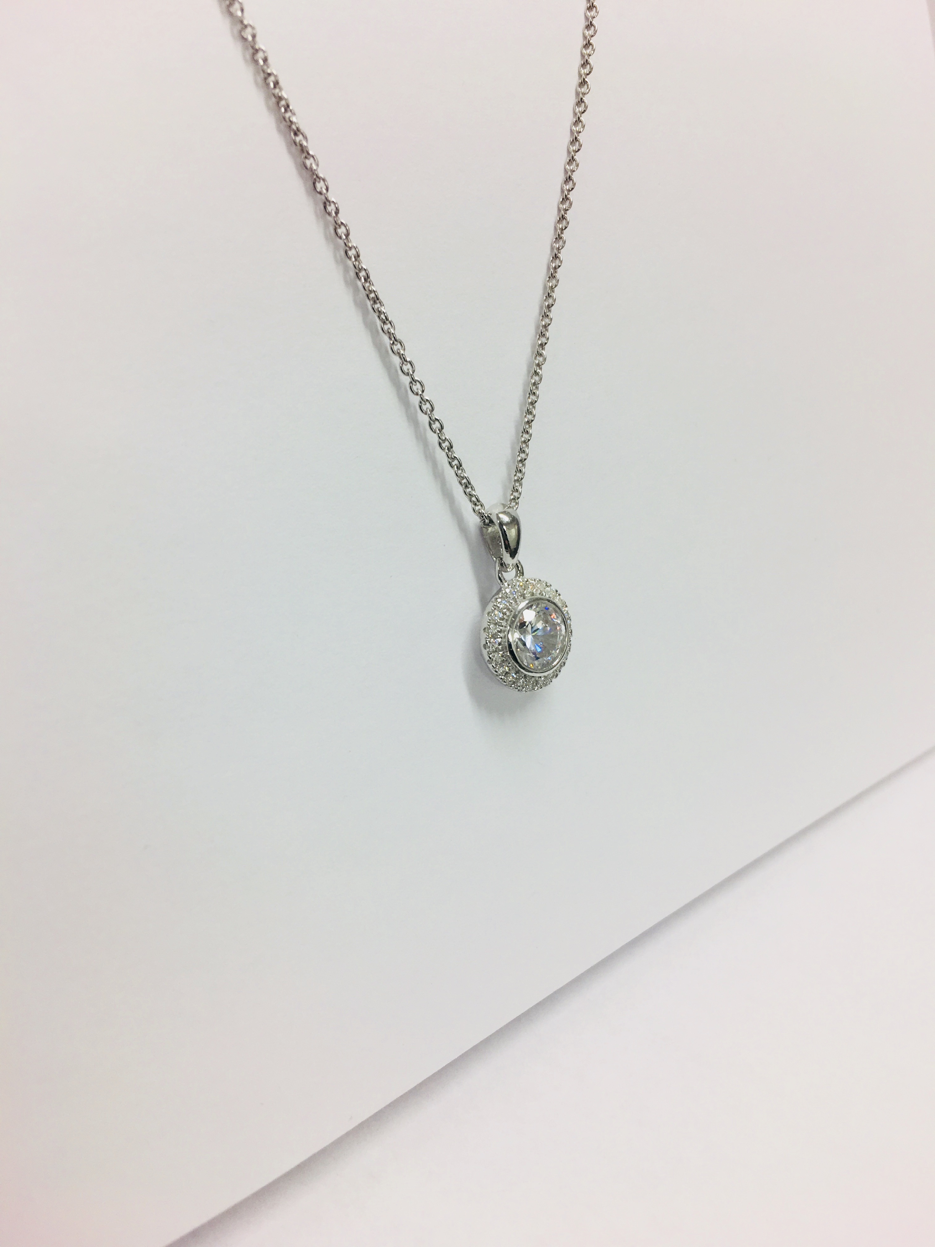 0.50ct diamond set pendant. Brilliant cut diamond Hcolour, si1 clarity. Halo setting with diamonds - Image 4 of 5