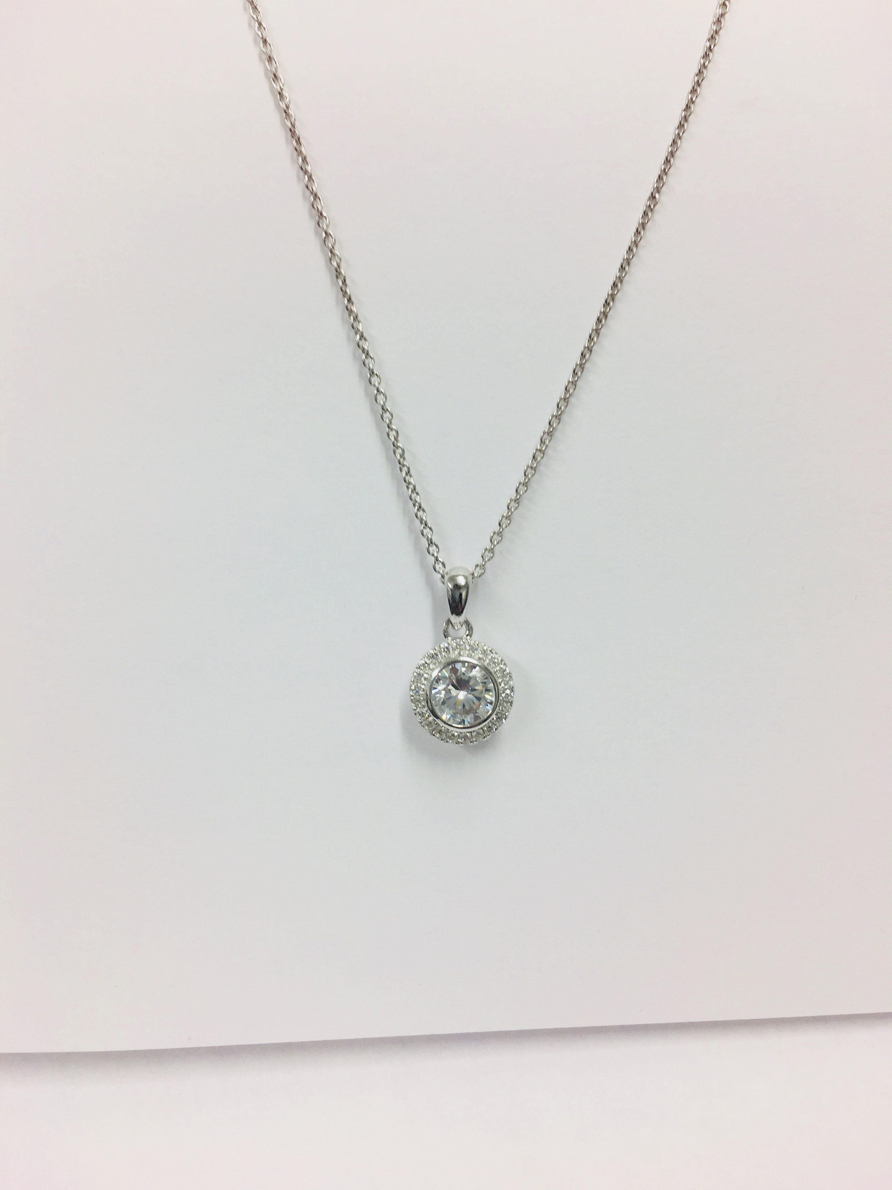 0.50ct diamond set pendant. Brilliant cut diamond Hcolour, si1 clarity. Halo setting with diamonds - Image 2 of 5