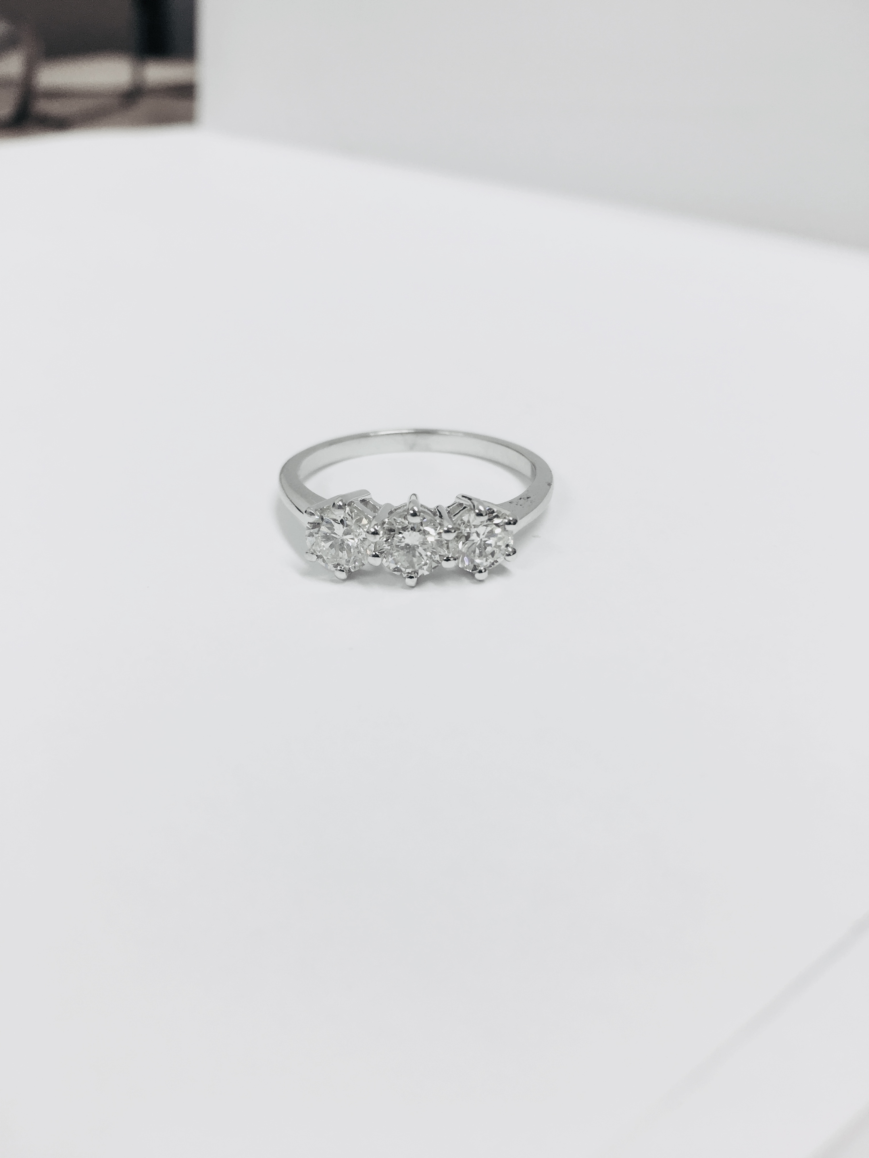 1.55ct diamond trilogy ring. 3 brilliant cut diamonds I colour, si1 clarity. Set in 18ct white