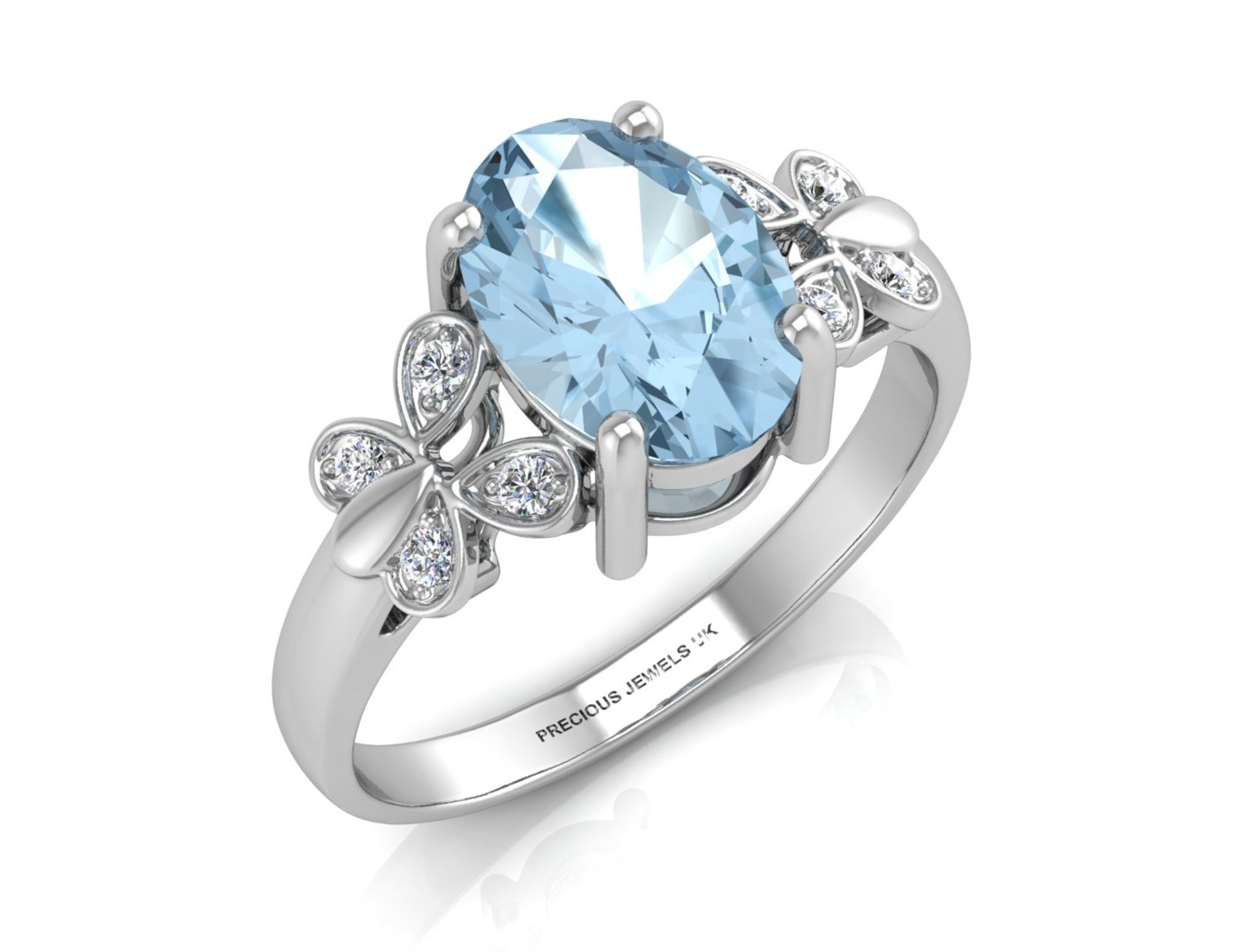 9ct White Gold Diamond And Blue Topaz Ring 0.03