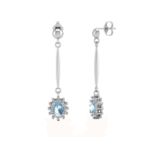 9ct White Gold Diamond And Blue Topaz Earring 0.12