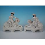 Pair Staffordshire Pottery Children on Afghan hounds