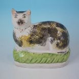 Staffordshire pottery cat figure