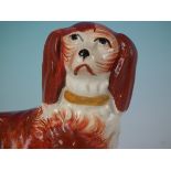 Pair Staffordshire spaniel on cushion inkwells