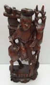 Antique Vintage Hard Wood Carved Immortal Oriental Figure On Back of a Stag. Measures 16 inches tall