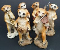 Vintage Collection of 6 Meerkat Musical Figures. Each measures 9 inches tall. Part of a recent