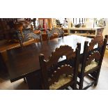 Jacobean revival Oak refectory table and chairs.