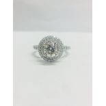 Platinum double Halo style Diamond Ring,1.60ct total diamond weight,0.90ct centre diamond,I colour,