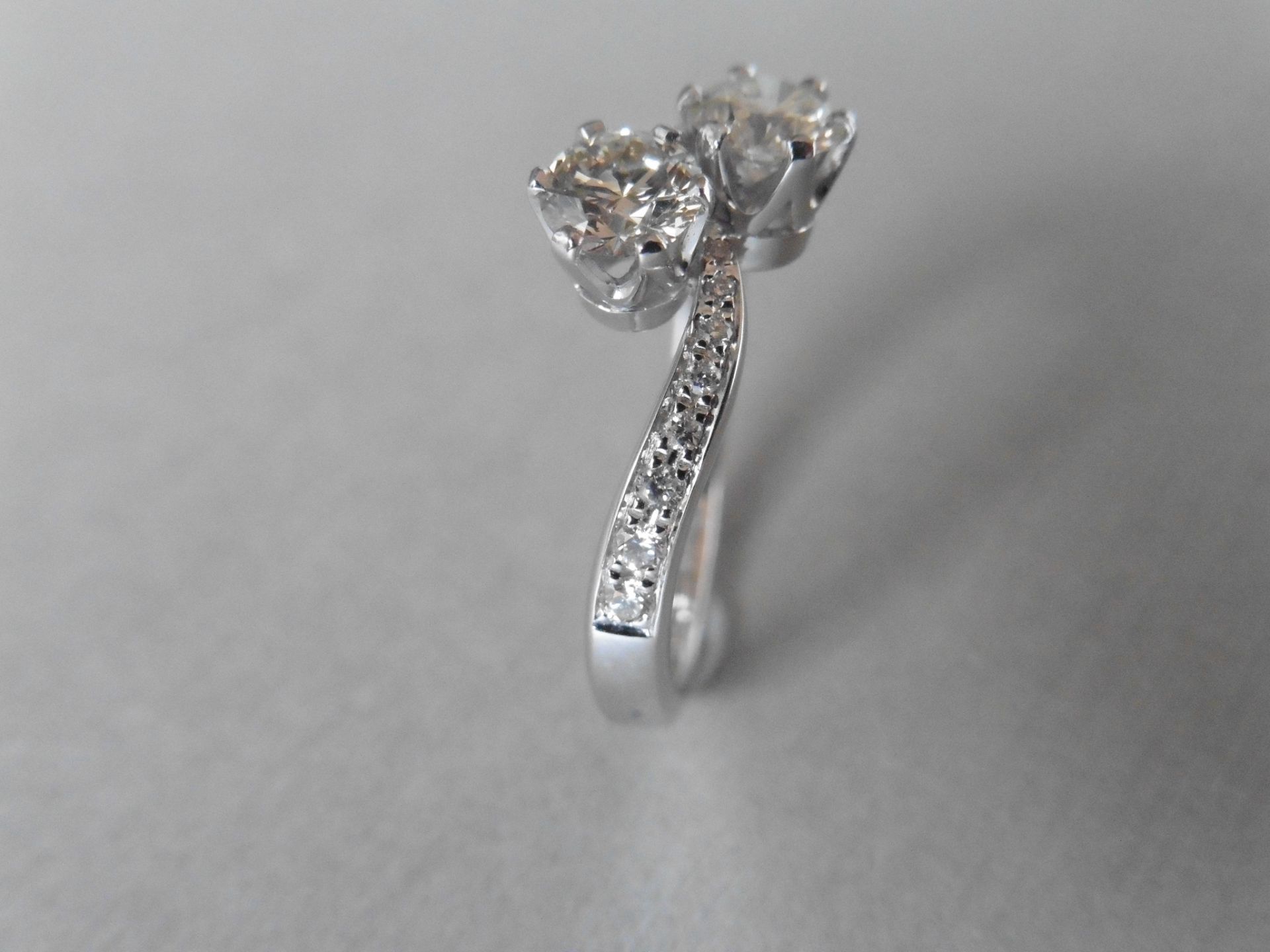 1.00ct diamond 2 stone twist ring. 2 brilliant cut diamonds 0.50ct each , G/H colour and VS - Image 2 of 4