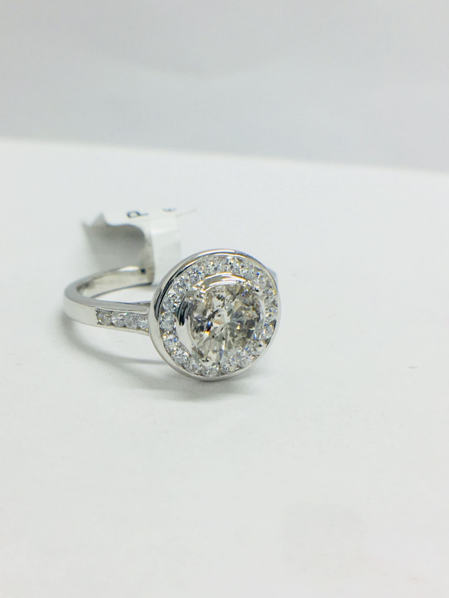 Platinum Channel set Halo style diamond ring,1.40ct diamond weight,centre 0.90ct,H colour - Image 8 of 8