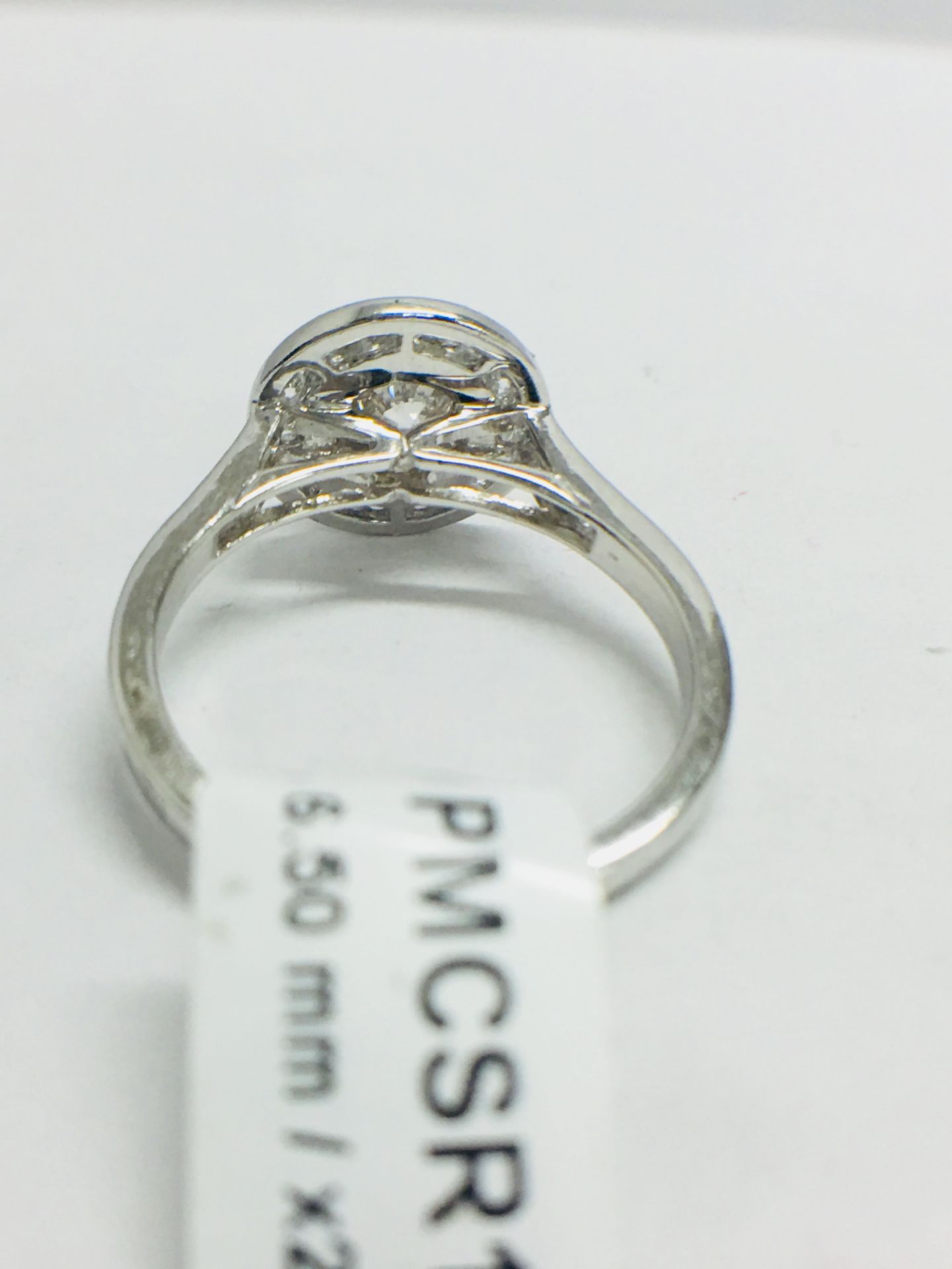 Platinum Channel set Halo style diamond ring,1.40ct diamond weight,centre 0.90ct,H colour - Image 5 of 8