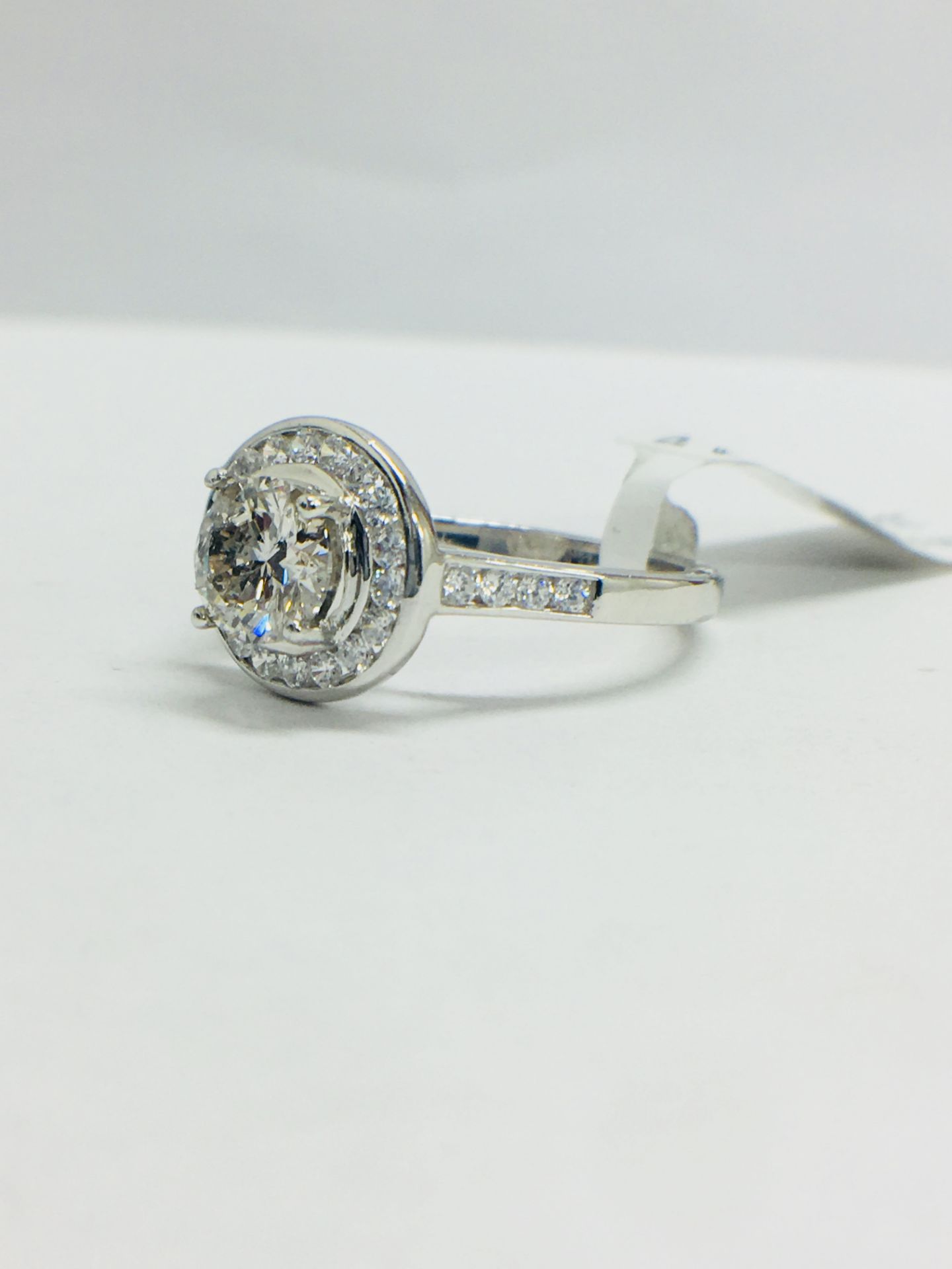 Platinum Channel set Halo style diamond ring,1.40ct diamond weight,centre 0.90ct,H colour - Image 2 of 8