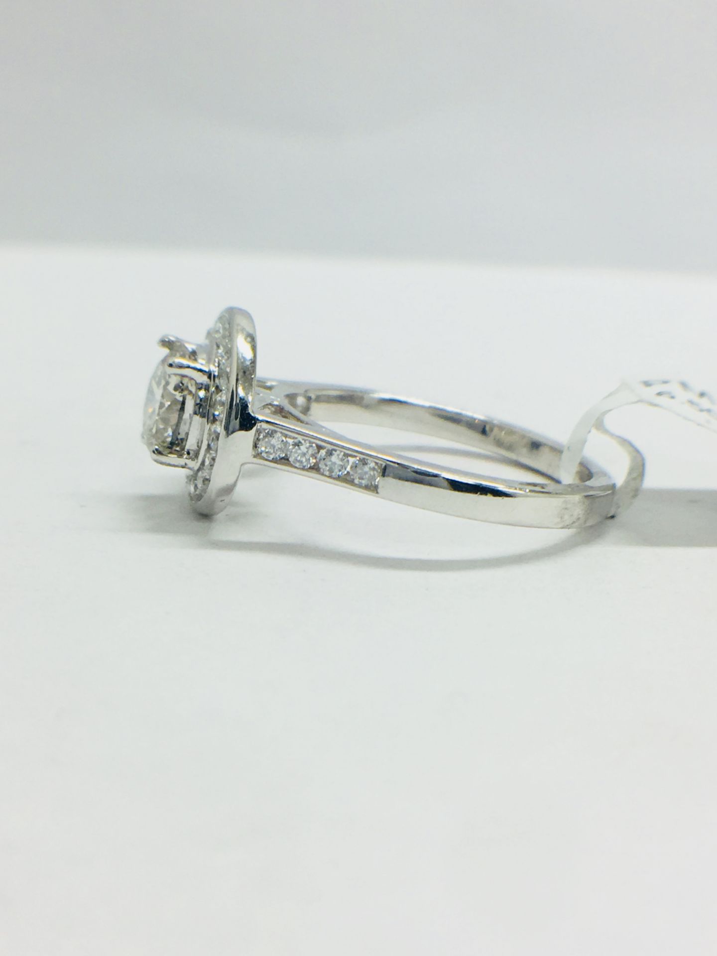 Platinum Channel set Halo style diamond ring,1.40ct diamond weight,centre 0.90ct,H colour - Image 3 of 8