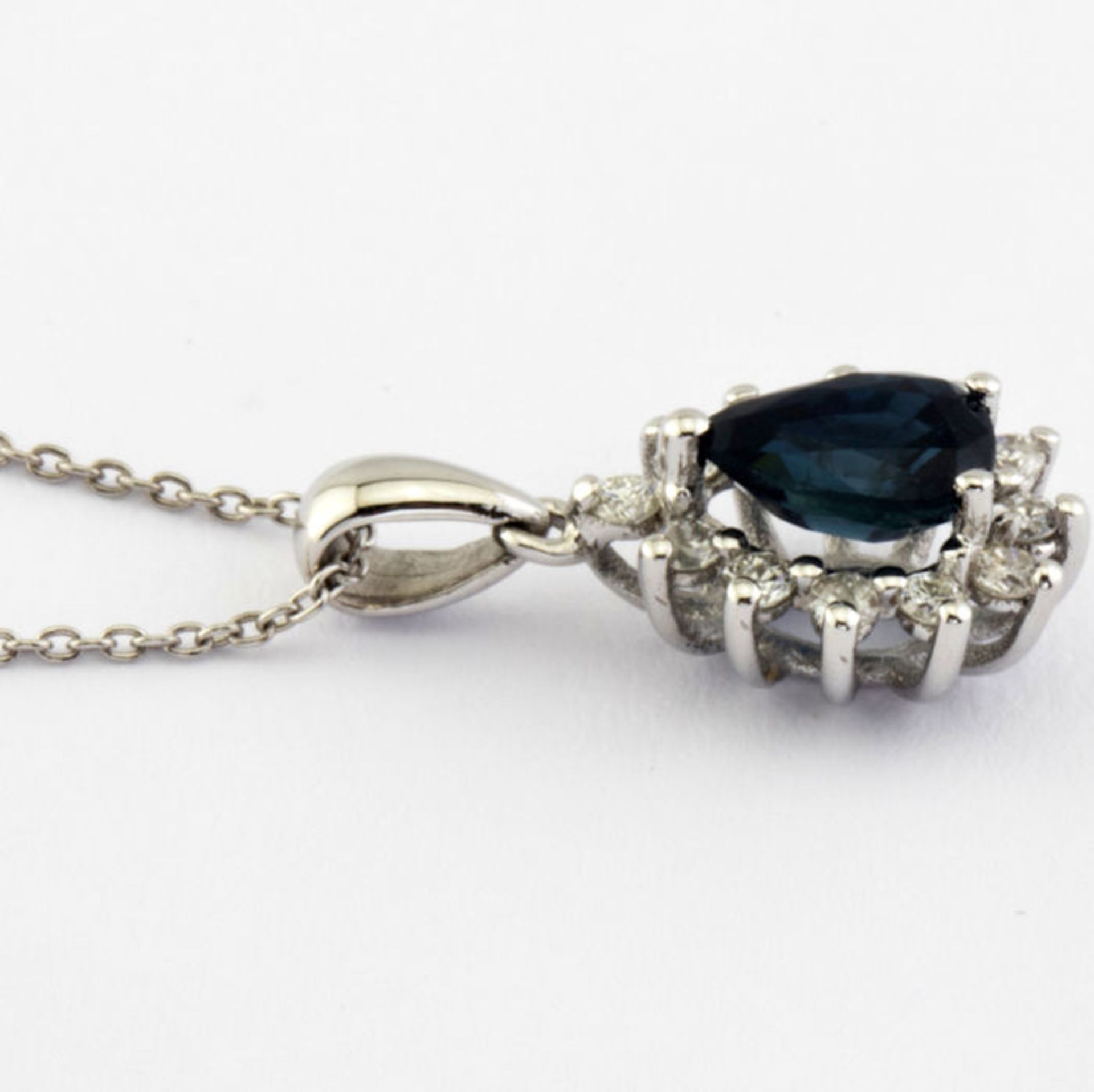 14K White Gold Cluster Pendant set with a natural sapphire and 12 brilliant cut diamonds - Image 2 of 6