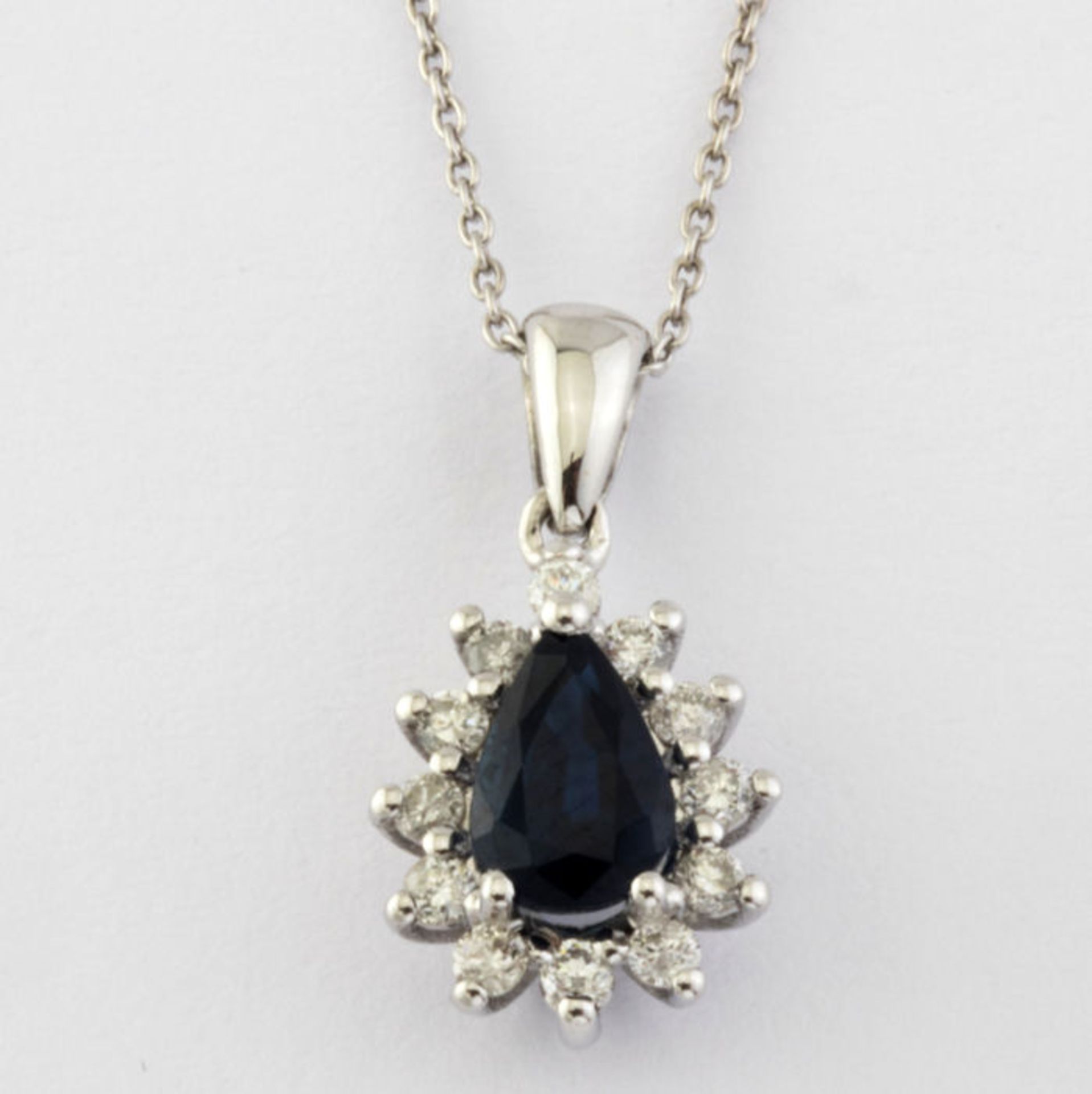 14K White Gold Cluster Pendant set with a natural sapphire and 12 brilliant cut diamonds - Image 4 of 6