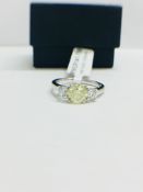 Platinum diamond three stone ring,1ct centre diamond natural fancy canary yellow,2x 0.25ct Brilliant