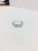 Platinum diamond Trilogy Ring,3 Brilliant cut diamonds,0.50ct centre si clarity H colour,2* 0.25ct
