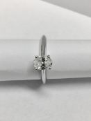 Platinum oval diamond solitaire ring.0.30ct oval diamond si clarity h colour,2.9gms platinum setting