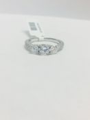 1.10ct Platinum diamond three stone ring,0.50ct brilliant cut centre,0.50ct sides,H colour si