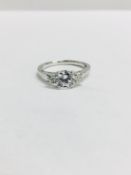 Platinum diamond three stone Ring,0.50ct brilliant cut diamond centre si clarity H colour,two 0.10ct