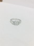 Platinum diamond three stone ring,1ct Radiant cut diamond,g colour si2 clarity,good symmetry,two 3.