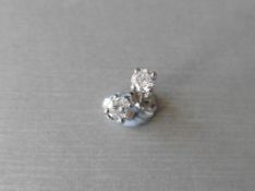 0.30ct diamond solitaire stud earrings set in platinum. I colour, si3 clarity. 4 claw setting with