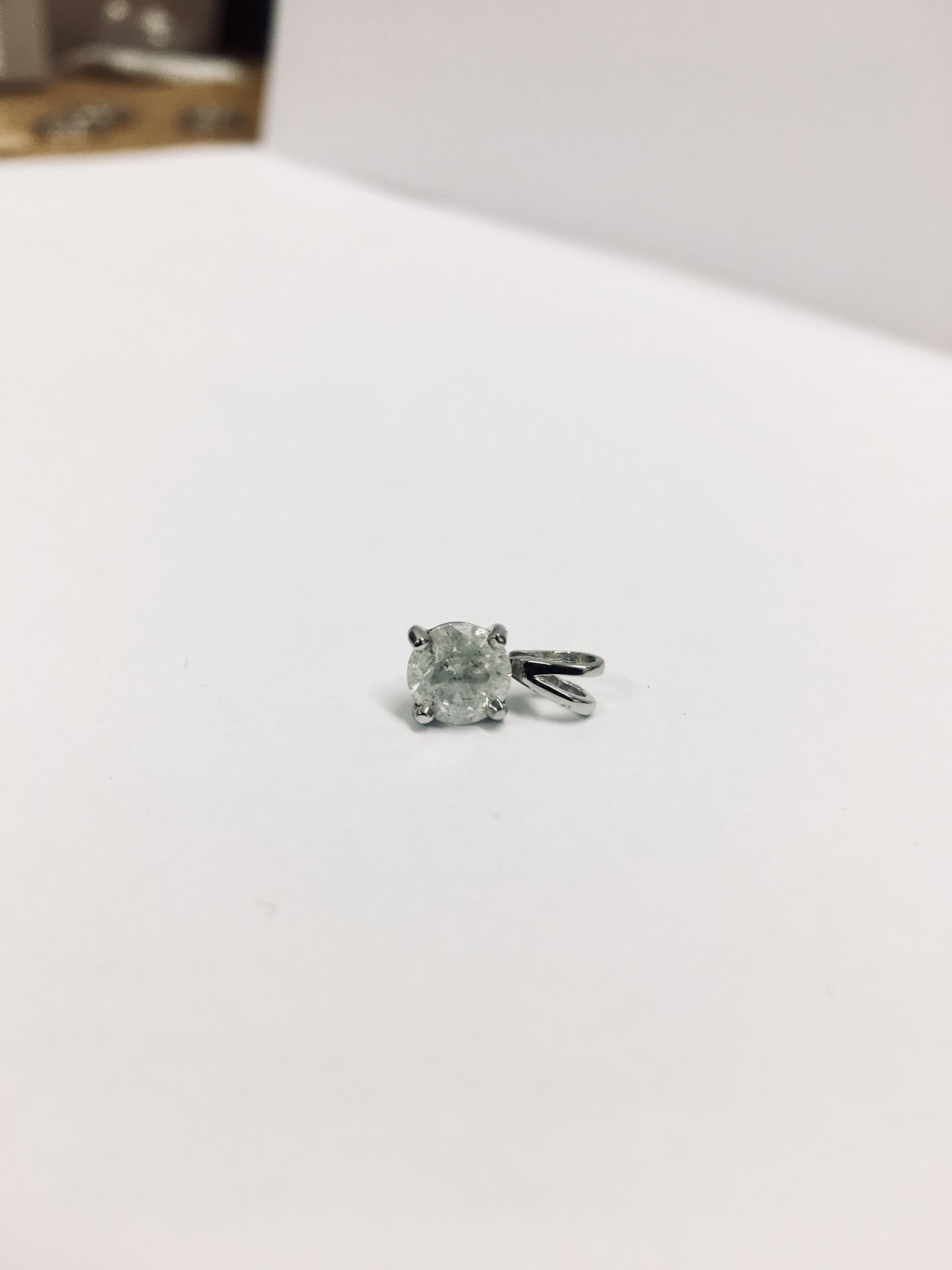 Platinum diamond pendant,1ct diamond 9enhanced ) h colour i2 clarity,1.8gms plainum uk hallmark ,