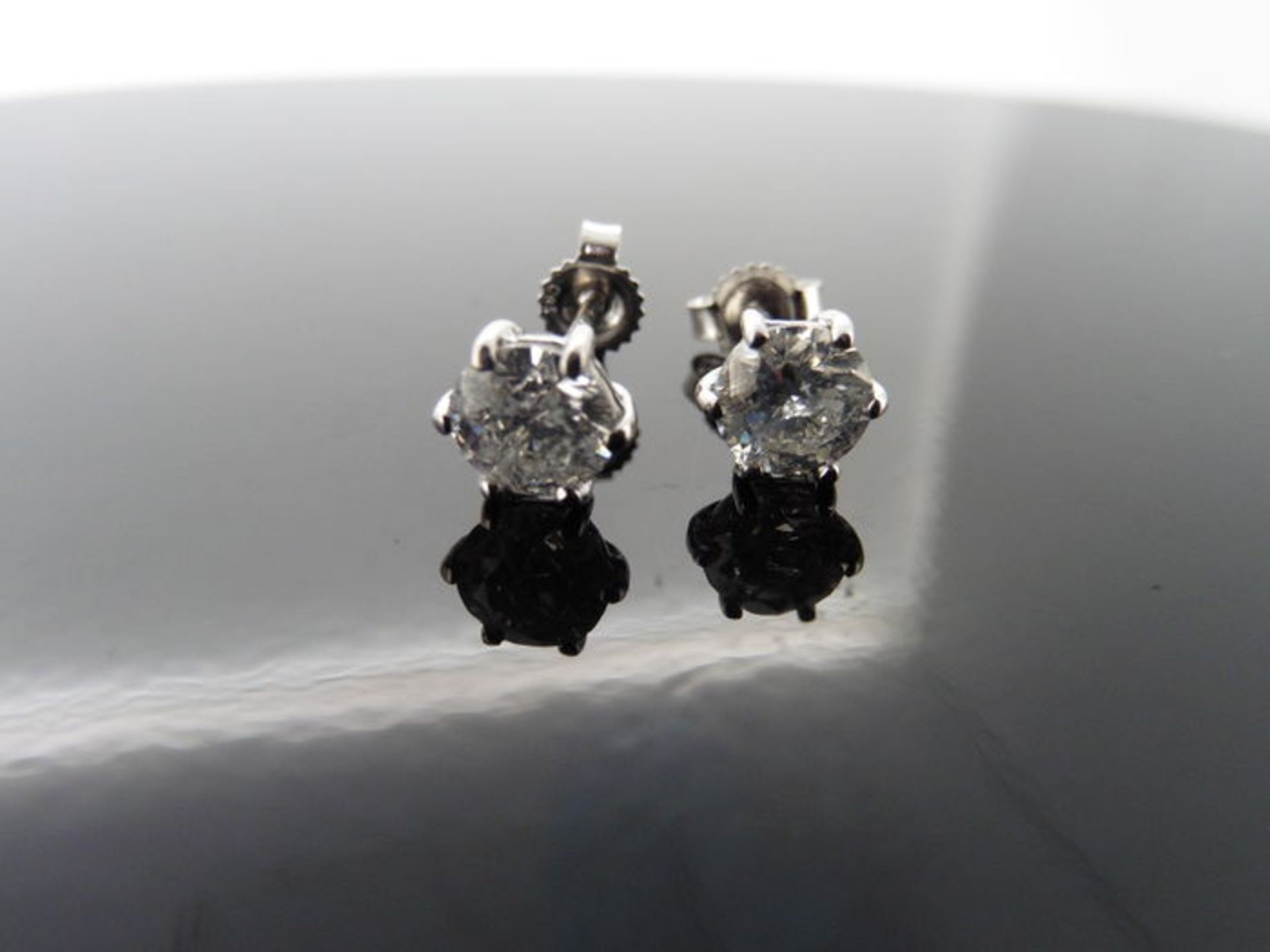 2.01ct Diamond solitaire earrings set with brilliant cut diamonds, H colour I1 clarity. Six claw