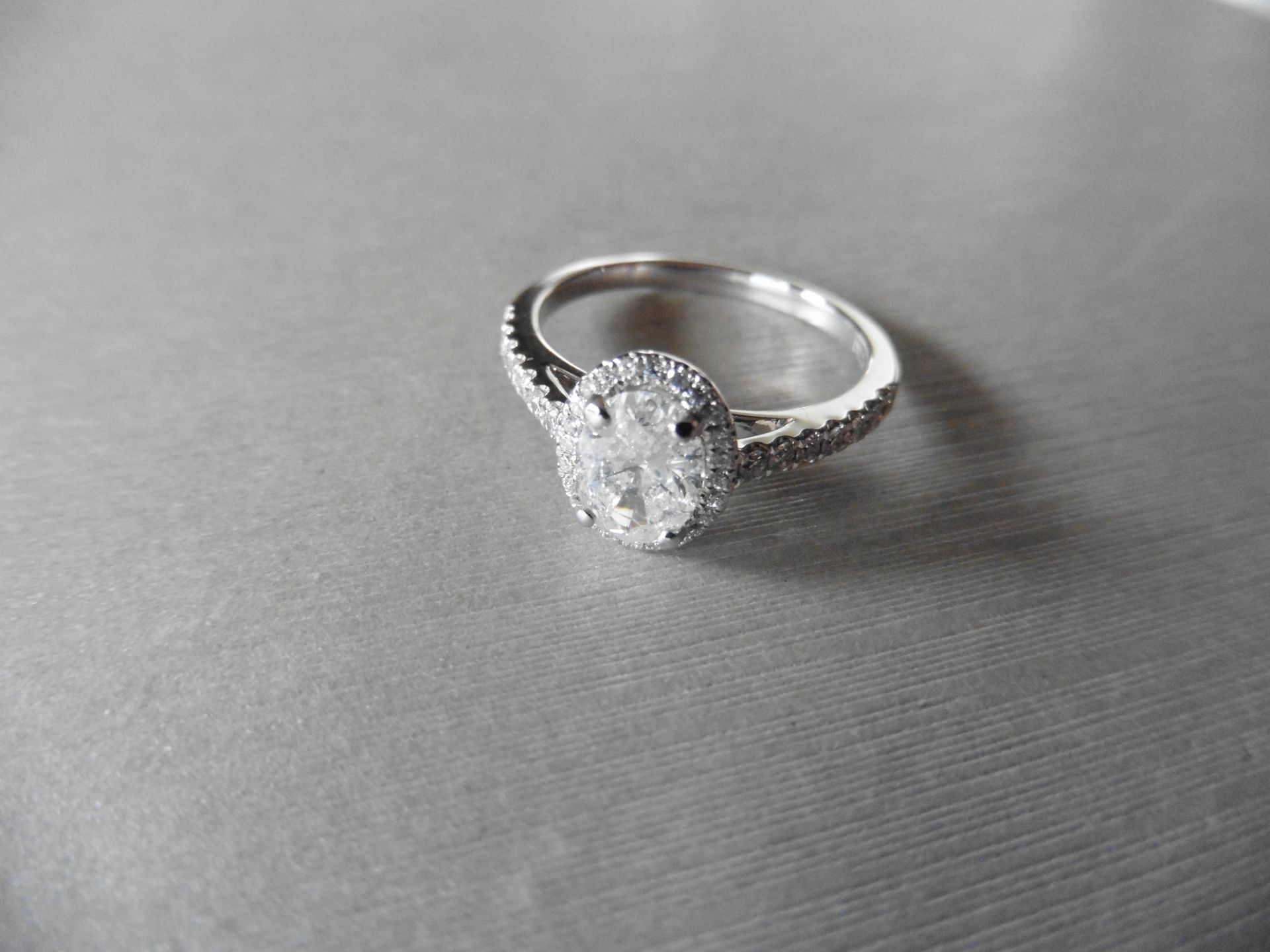 0.91ct oval diamond vs1 clarity,i colour,18ct white gold halo diamond setting,0.35 ct h colour si - Image 3 of 3
