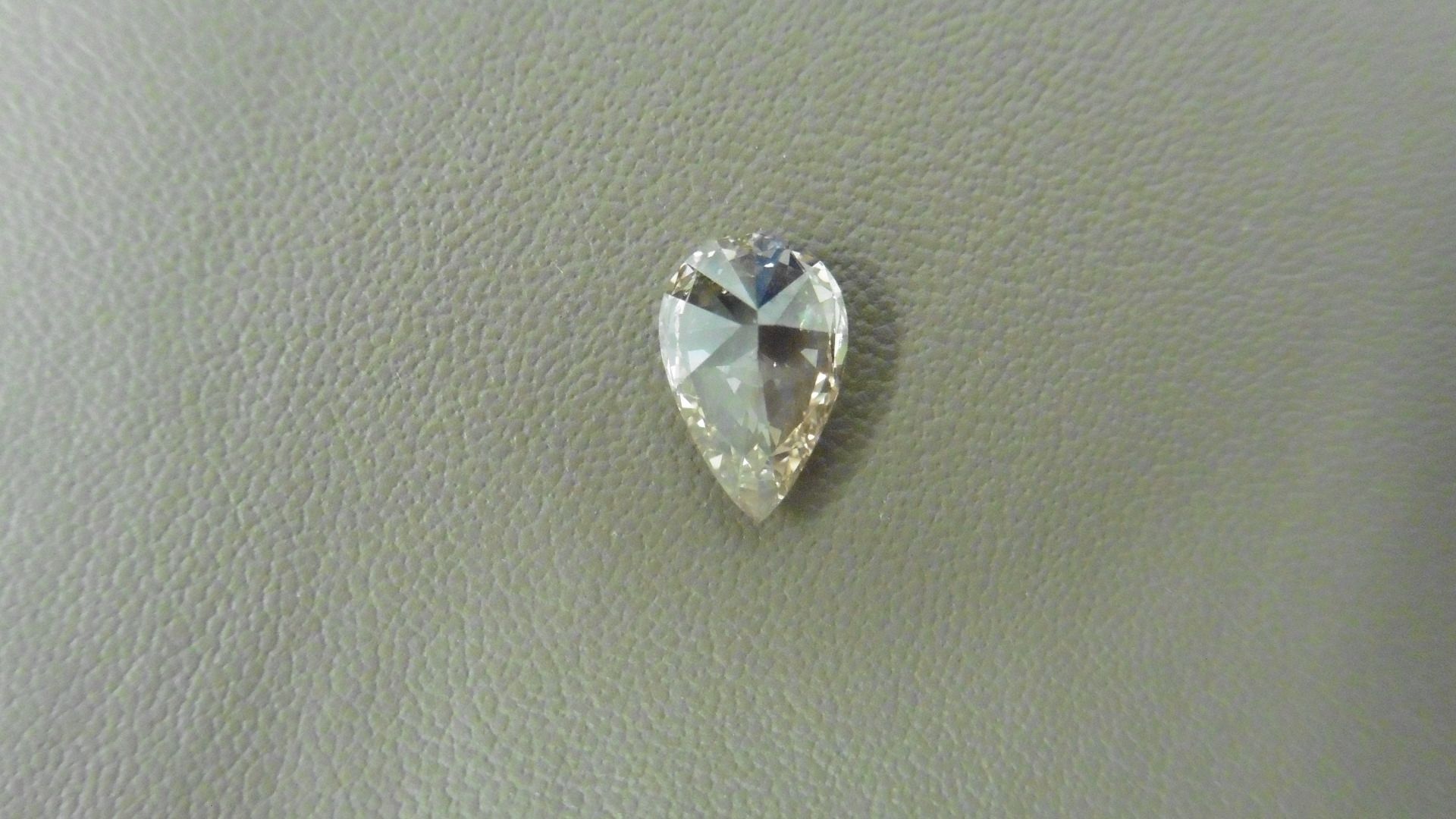 1.02ct pear shaped diamond, loose stone. N ( faint brown ) colour and SI1 clarity. 8.85 x 5.79 x 3. - Image 6 of 6