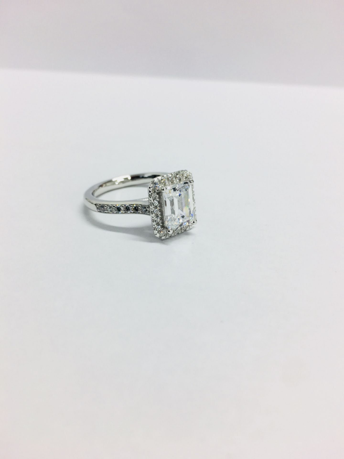 1.2ct diamond solitaire ring set with an emerald cut diamond, H colour and S1 clarity. Set in a - Image 7 of 8