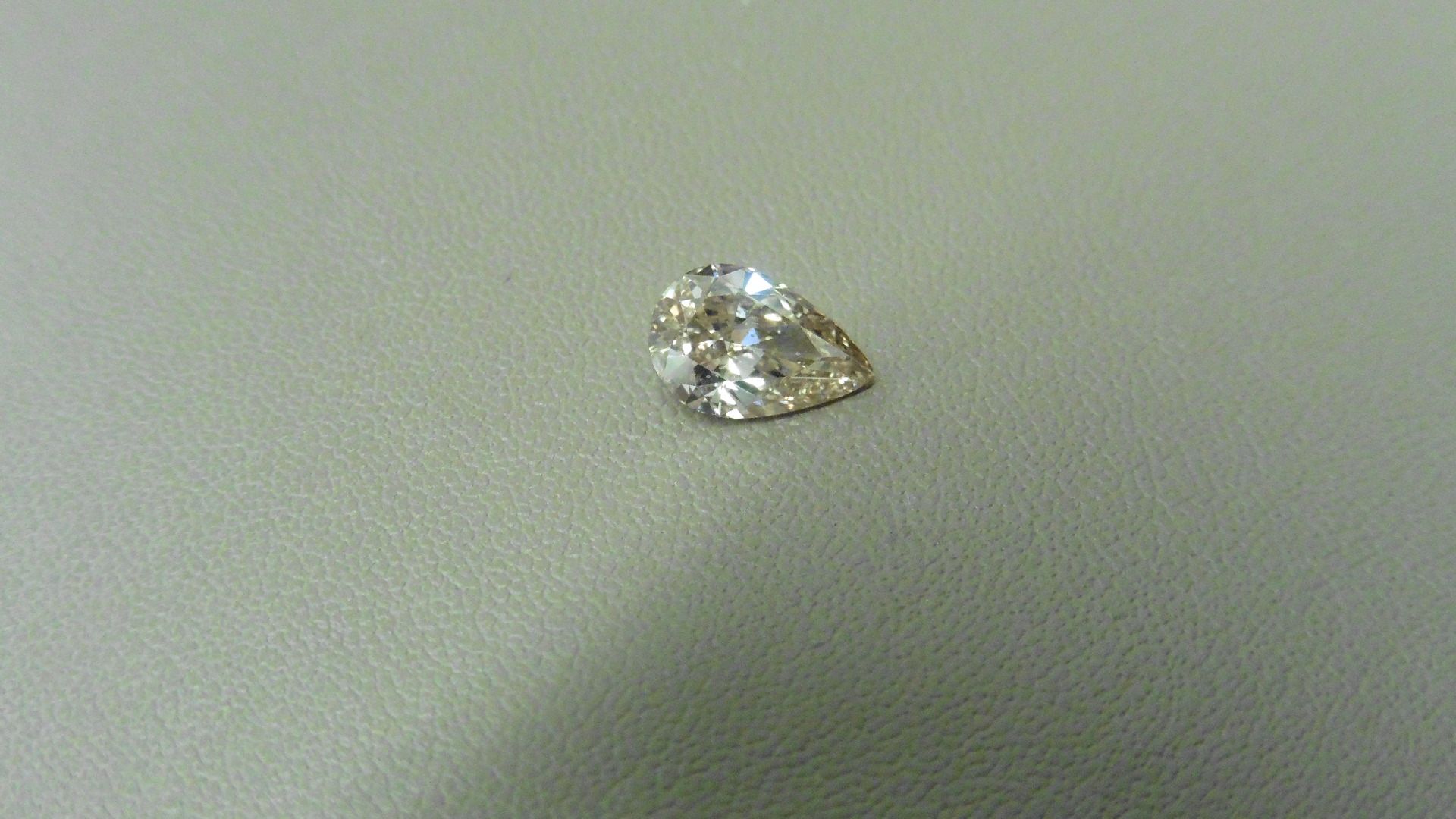 1.02ct pear shaped diamond, loose stone. N ( faint brown ) colour and SI1 clarity. 8.85 x 5.79 x 3. - Image 4 of 6
