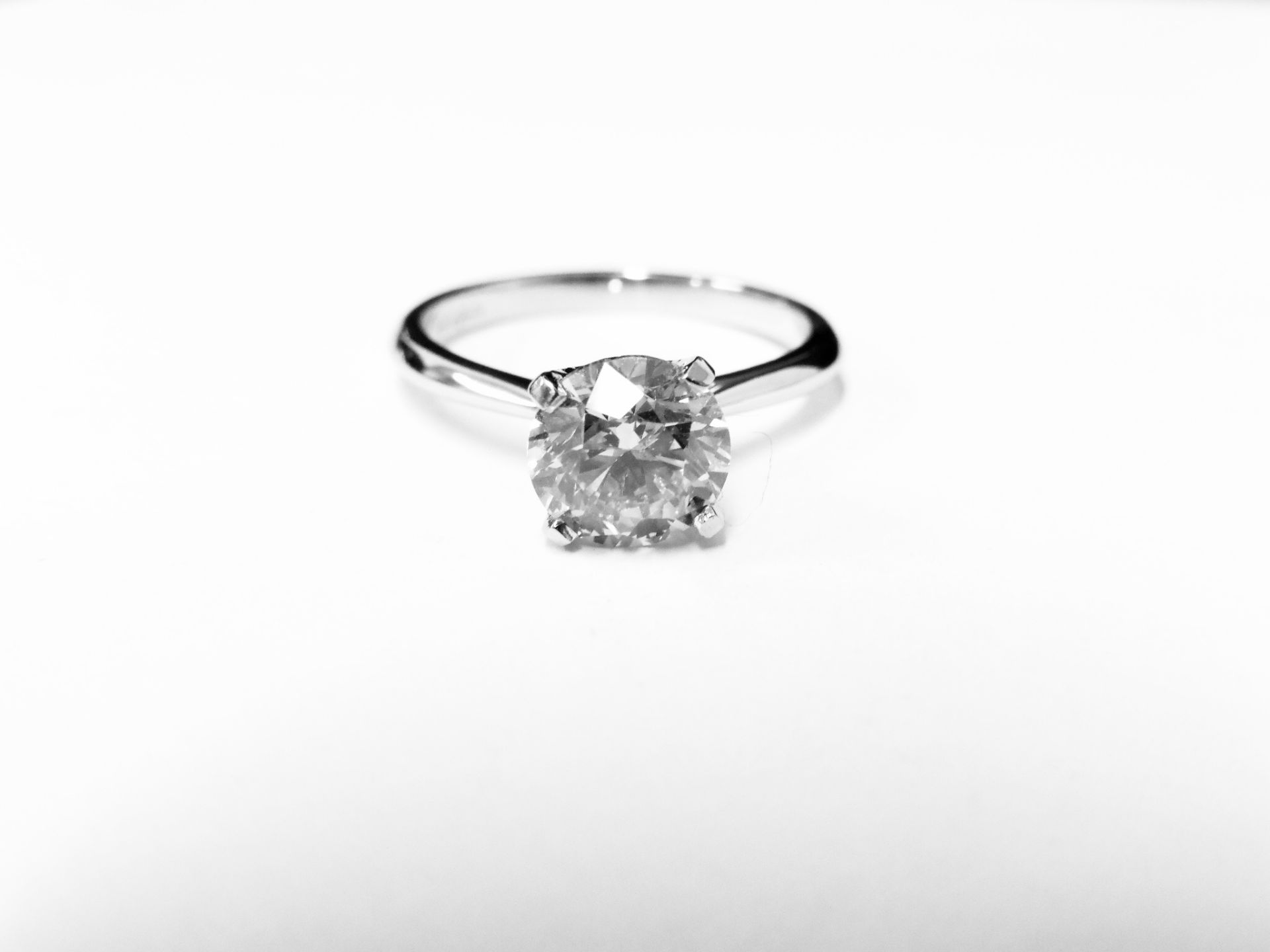 1.50ct diamond solitaire ring set in 18ct gold. Enchanced diamond, H colour and I2 clarity. 4 claw