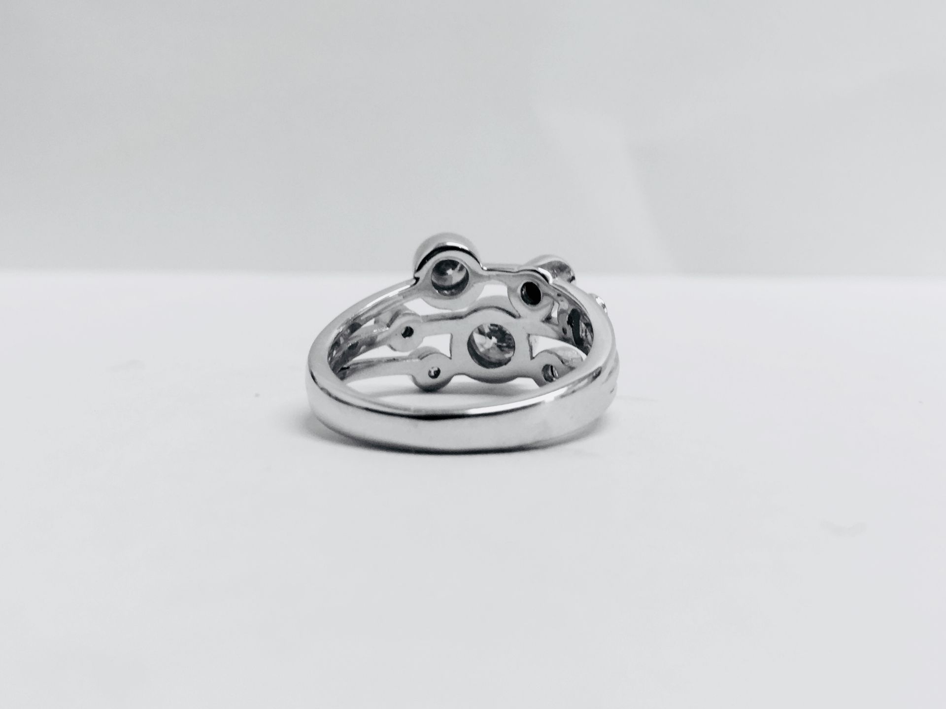 1.00ct 9ct white gold diamond dress ring, rain dance style. Set with 7 graduated brilliant cut - Image 2 of 3