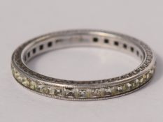 Large Silver Ring Encrusted With White Stones