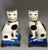 Pair of Small Antique Staffordshire Cat Figurines Seated on Blue Pillows