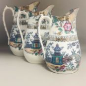 Antique 19th Century - Set of three Graduated Chinoiserie Pottery Dresser Jugs