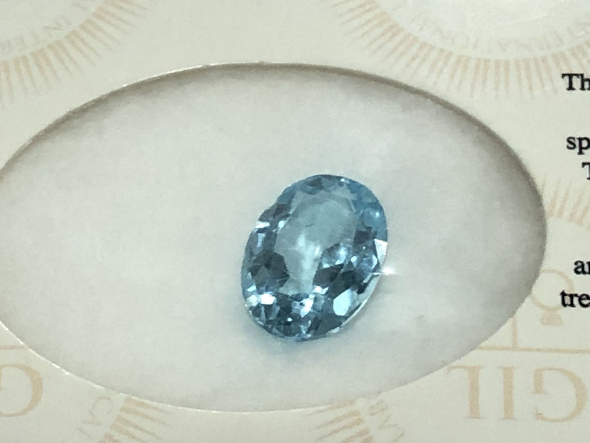 6.79ct Natural Topaz with GIL Certificate - Image 2 of 3