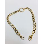 9K yellow and white gold open curb style bracelet 12", 7.6g