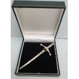 Vintage Retro Silver Coloured Metal Kilt Pin Shapes as a Sword Boxed. Measures 4 inches long. Part