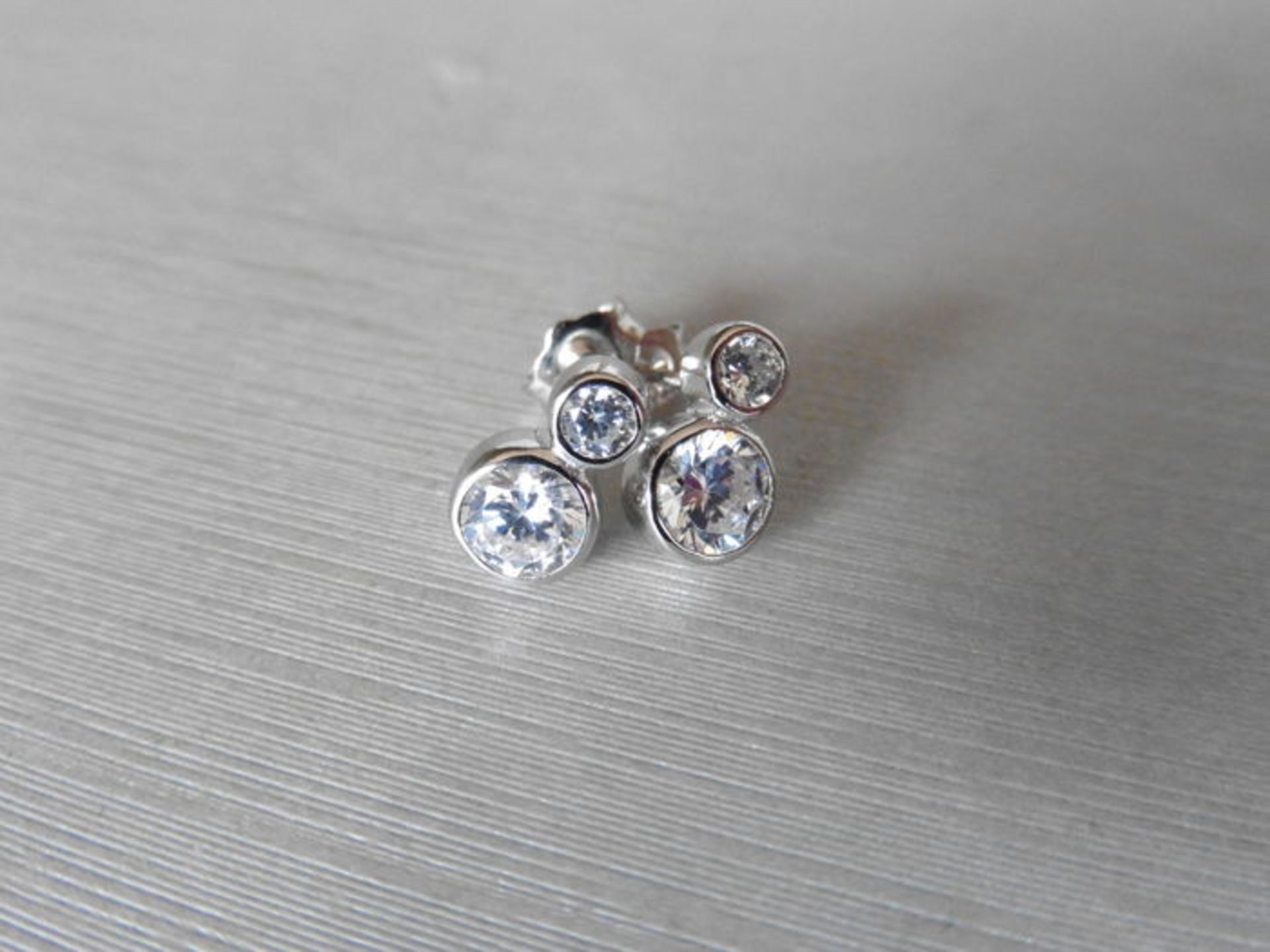 0.80ct diamond drop earrings each set with 2 graduated brilliant cut diamonds, I/J colour, si2 - Image 2 of 2