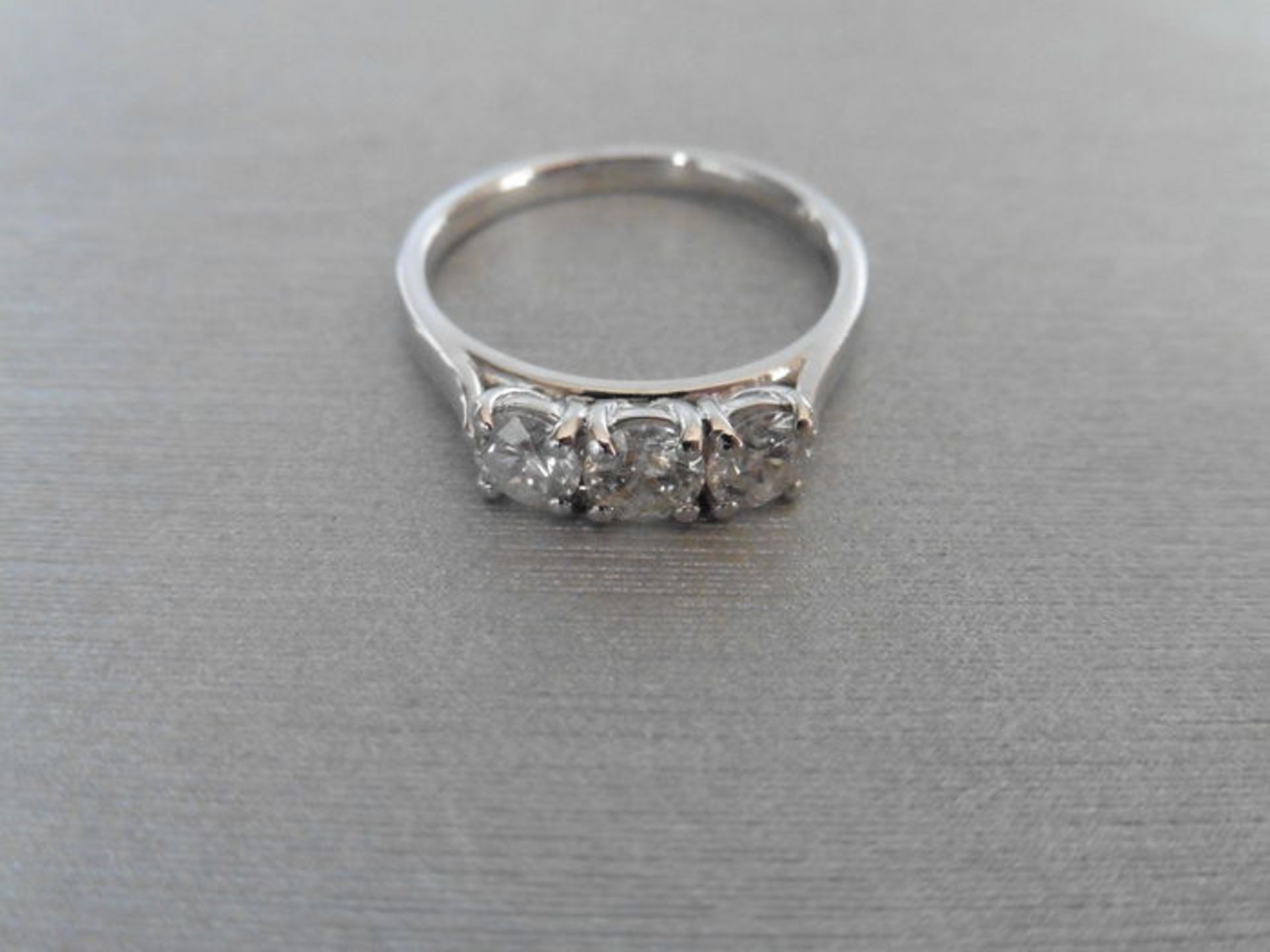 0.75ct diamond trilogy stone ring set in 18ct gold. 3 brilliant cut diamonds, I colour, si2 clarity. - Image 2 of 2