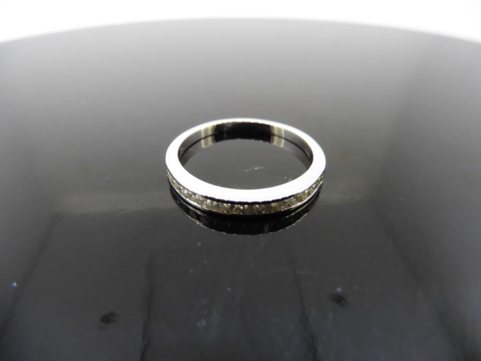 0.15ct diamond eternity ring set in 9ct white gold. Channel setting, H,I colour, Si2 clarity. Ring - Image 2 of 2