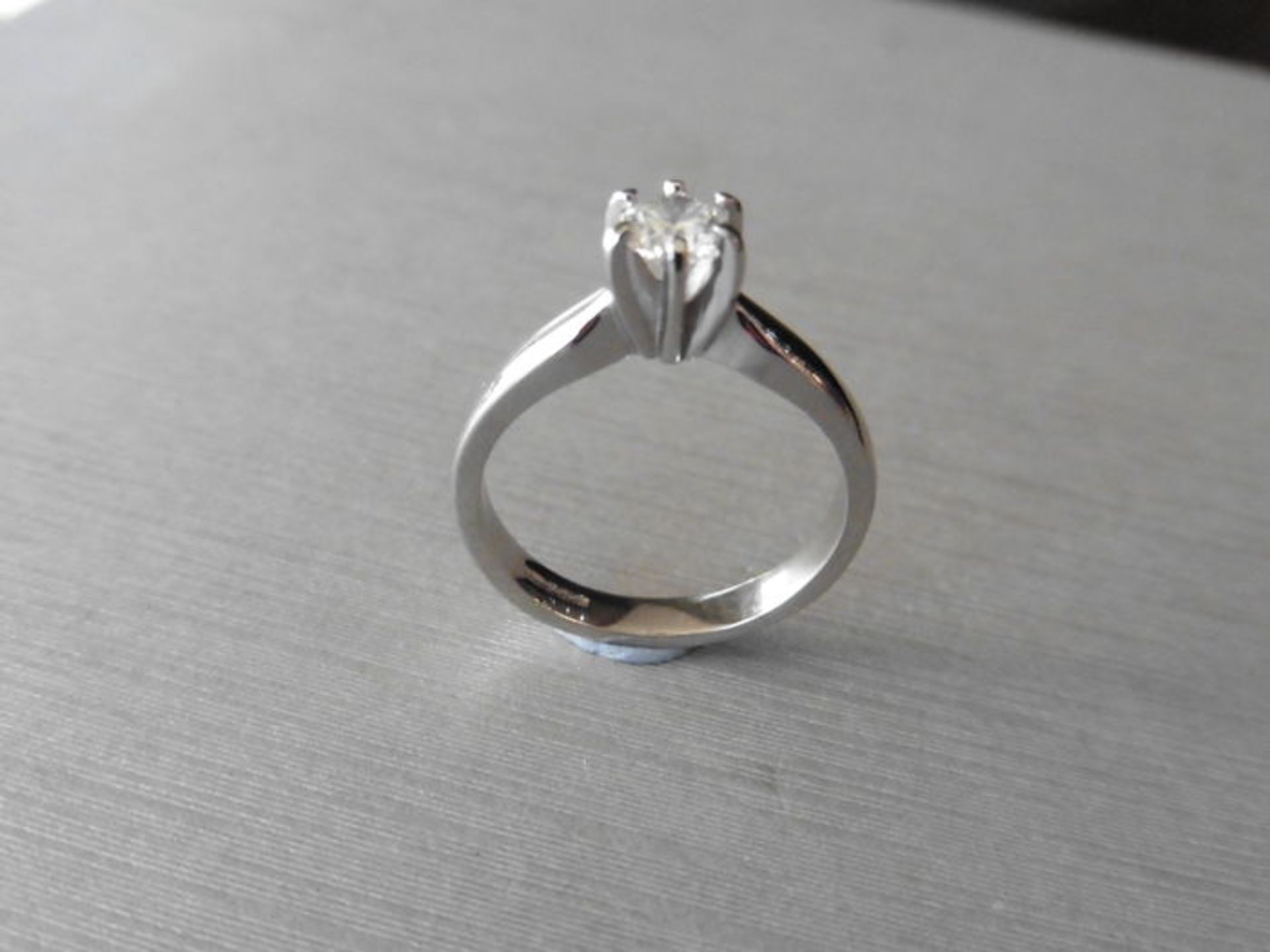 0.40ct diamond solitaire ring set in 18ct gold.6 claw setting. Brilliant cut diamond, I colour and - Image 2 of 2