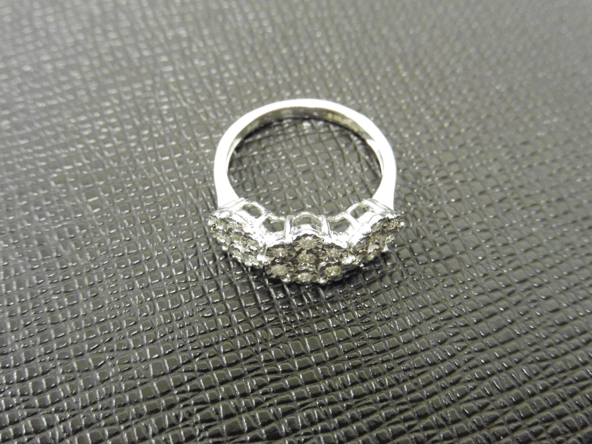 0.26ct trilogy style diamond ring set in 9ct white gold. Illusion setting with brilliant cut - Image 2 of 2