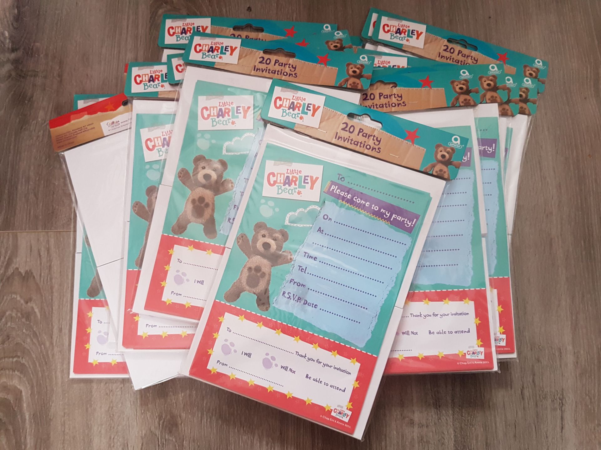 300 Little Charley Bear party invites with envelopes. Brand new packaged.