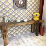 Console table or hall table is a re-purposed work bench and believed to be around 100 years old