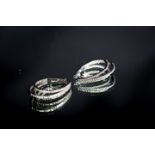 Beautiful bespoke triple horseshoe shaped earrings, featuring 2.20cts of brilliant-cut diamonds
